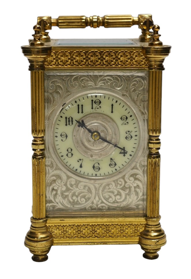 A late 19th French pierced brass cased eight day carriage timepiece, with key, 17cm. Condition - side panel cracked, not tested as working